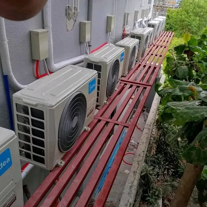 Professional HVAC technician performing maintenance on an air conditioning system